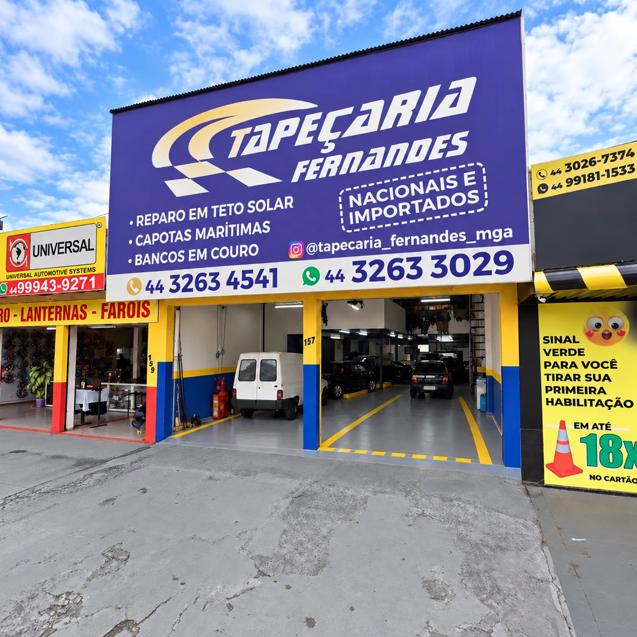 Fachada da Tapeçaria Fernandes, com letreiro azul e entrada da oficina no número 157.